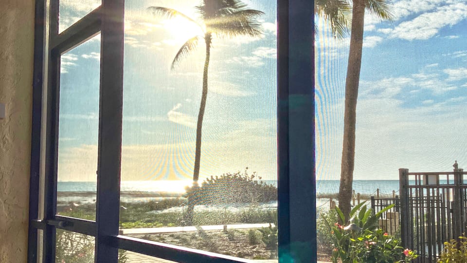 Your view of the beach from the screened lanai.