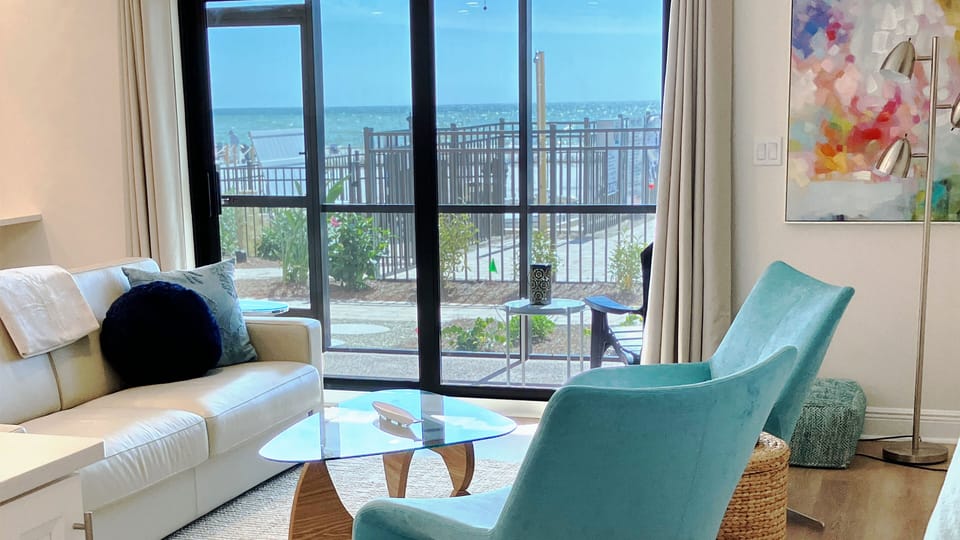 Right on the beach. Open the lanai door for direct access to the pool and beach!