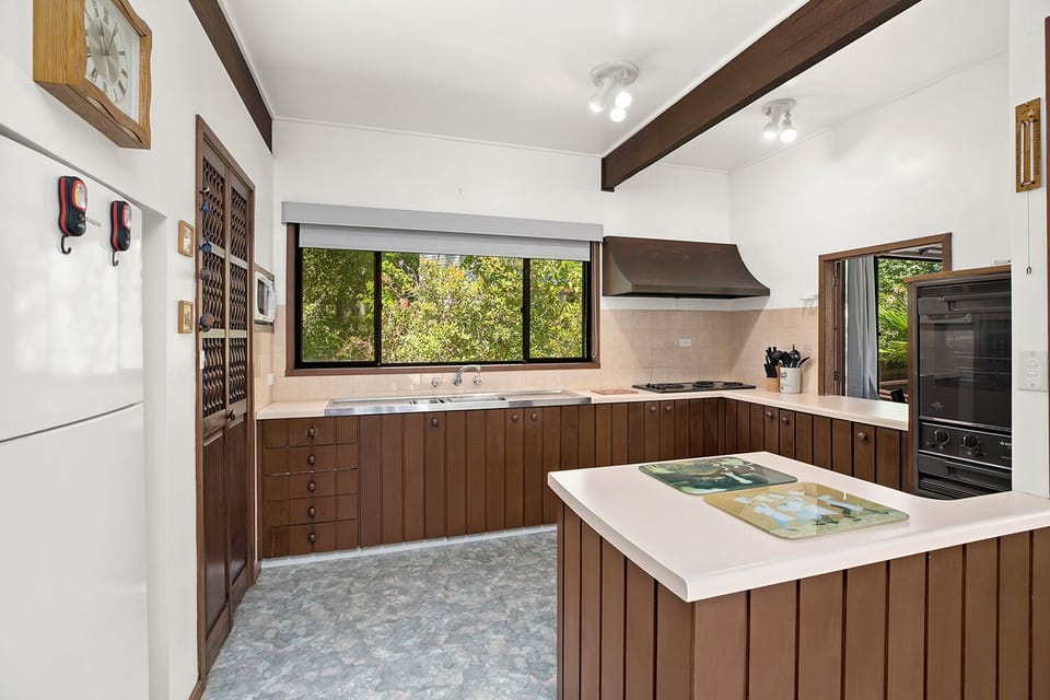 Kitchen well equipped for family getaways.