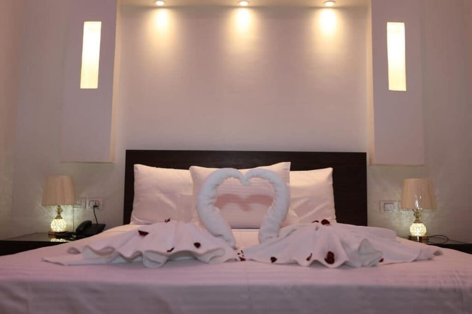 Deluxe Double Room, Balcony, City View | Hypo-allergenic bedding, memory foam beds, in-room safe, desk