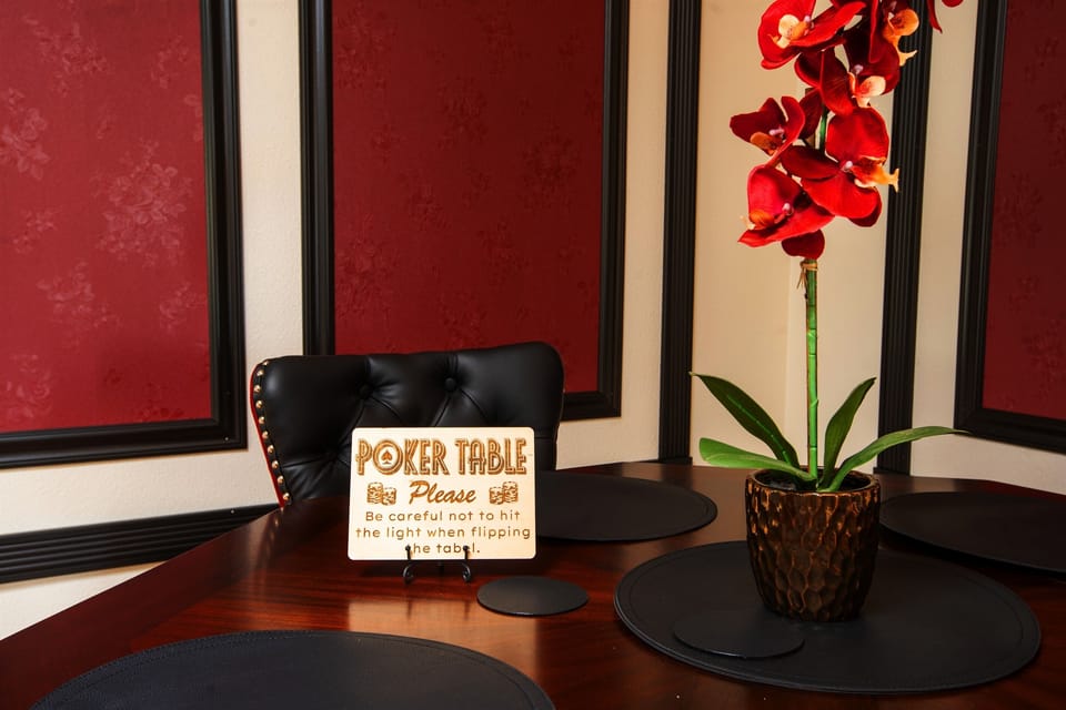 The dining table top flips over to become a Poker Table