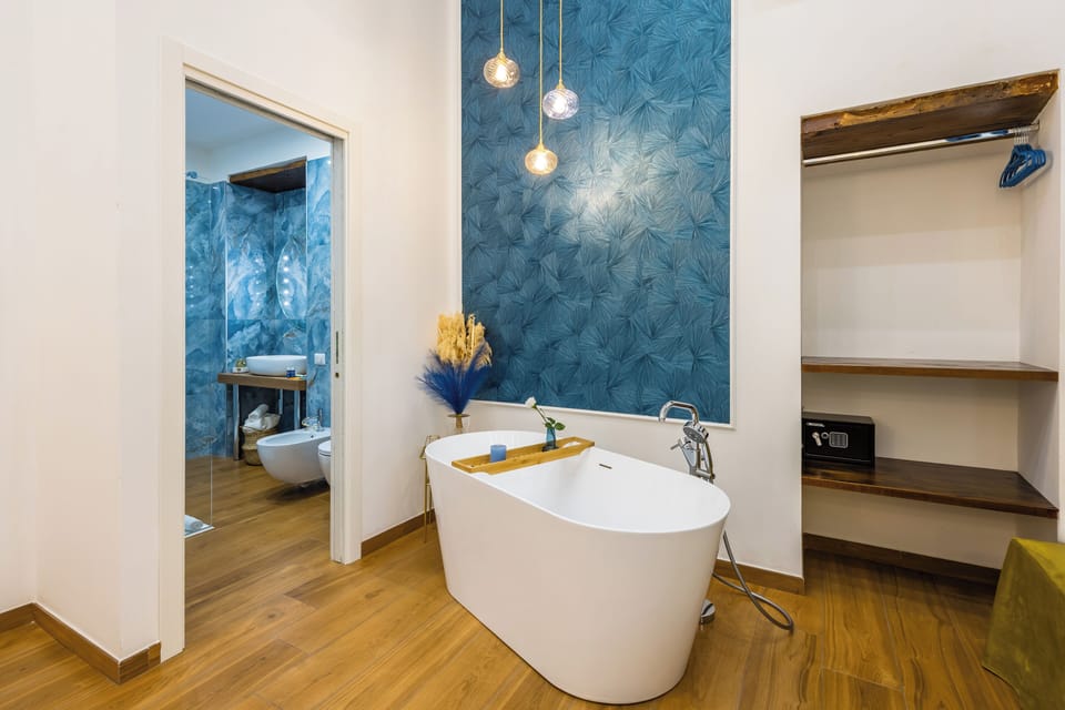 Luxury Room, Balcony, City View | Deep soaking bathtub