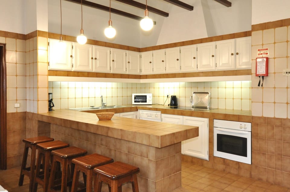 Kitchen with fitted oven