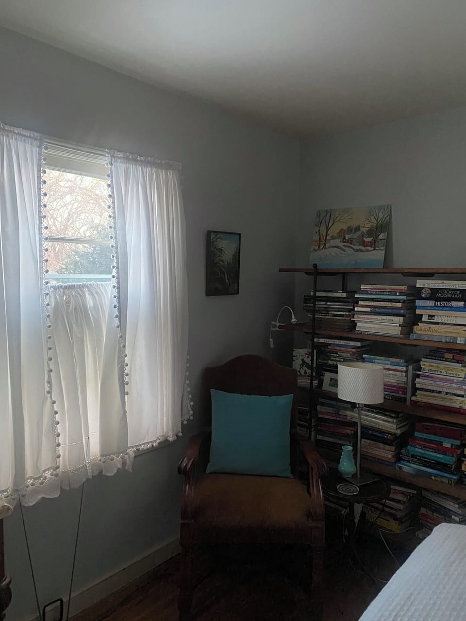 Book library and sitting area in sleeping room