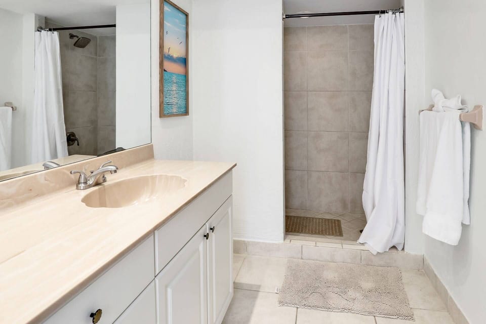 A walk-in shower completes the primary bathroom.
