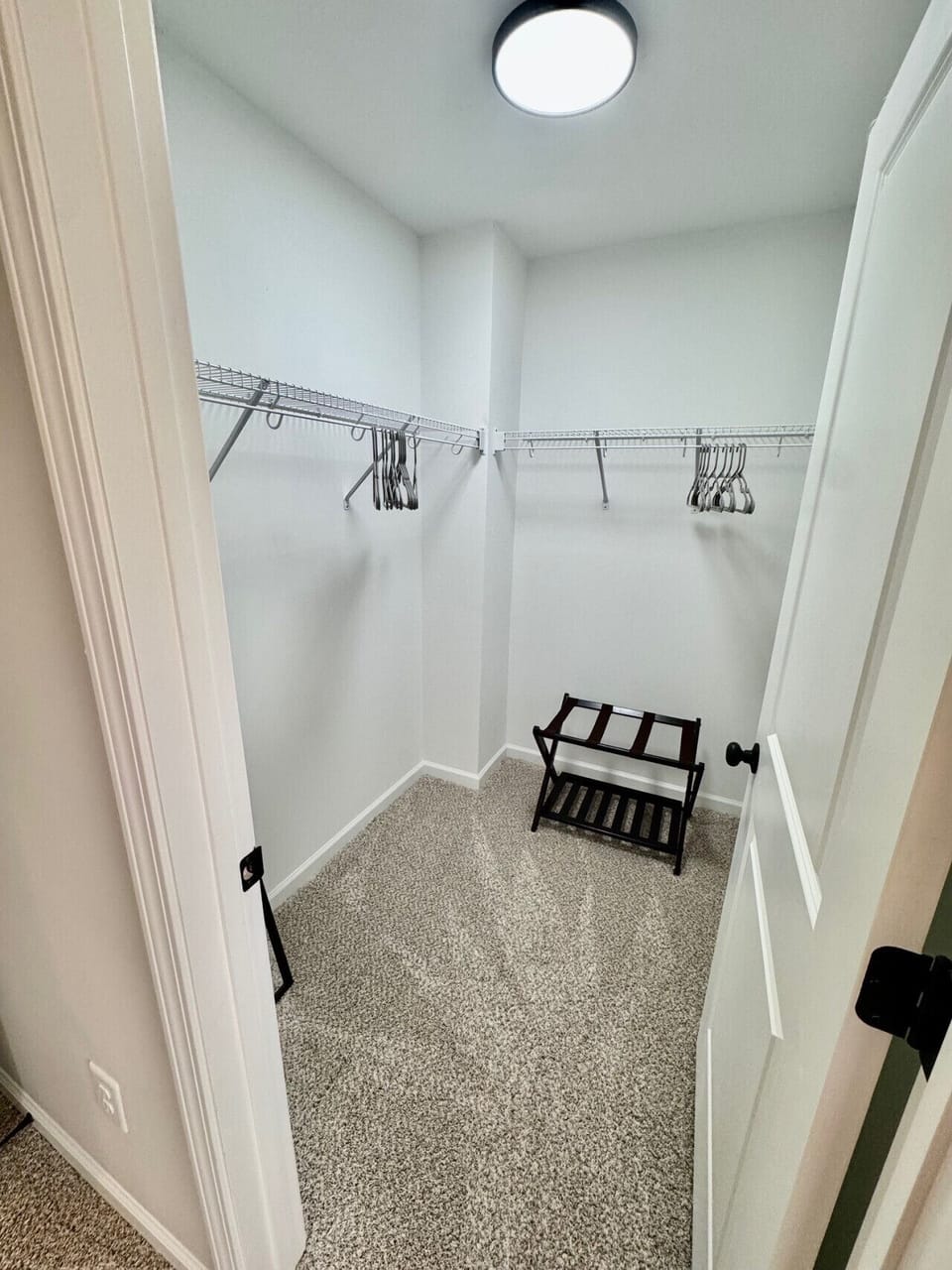 Walk-in closet in the primary bedroom.