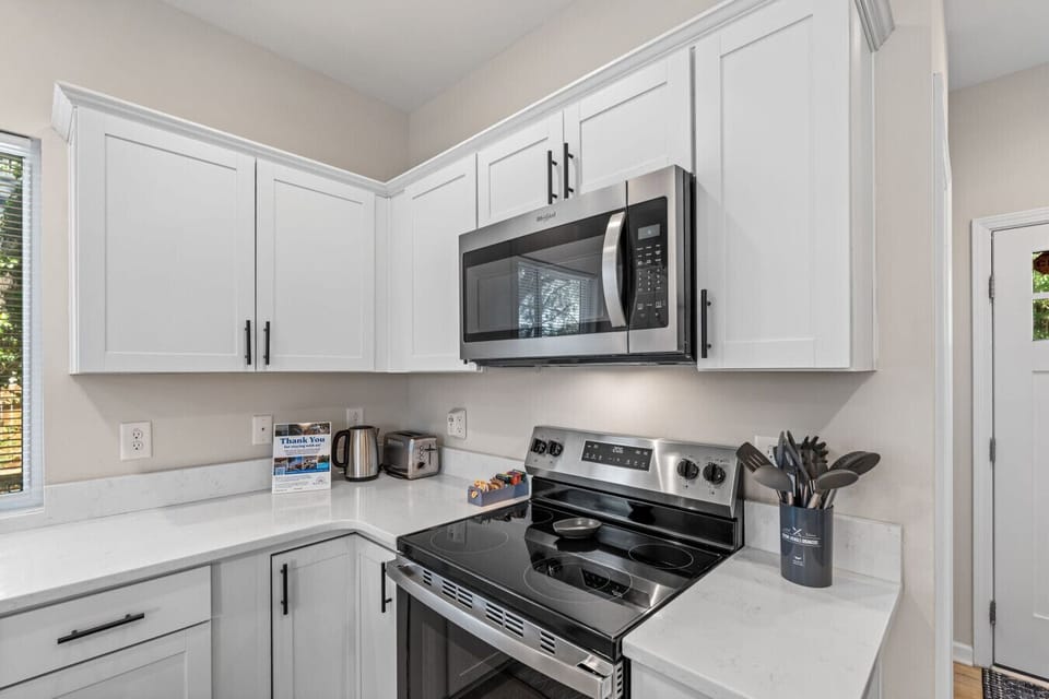 Brand new flat top stove, oven and microwave..