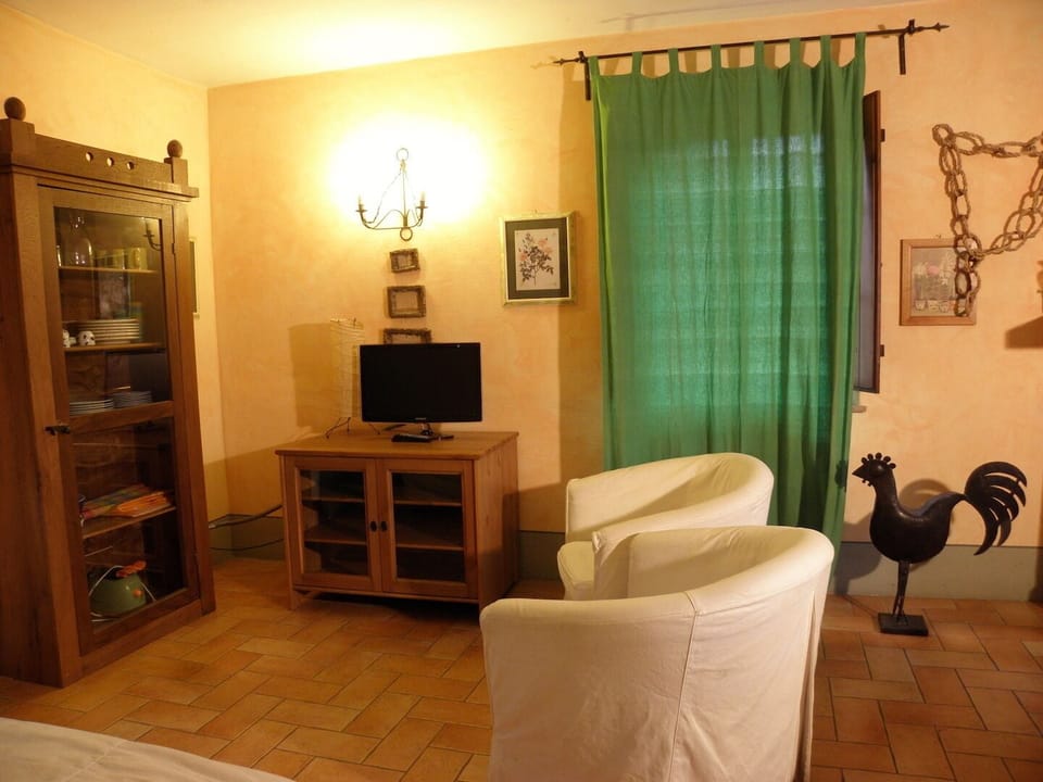 Condo, Hill View | Living area | 32-inch flat-screen TV with cable channels