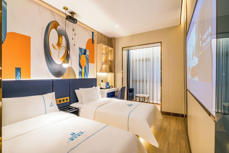 Premium bedding, down comforters, memory foam beds, minibar (free items)