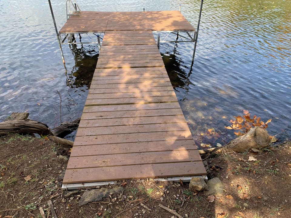 Dock, size:  24’ across & 8’ deep with the walkway of 32’.