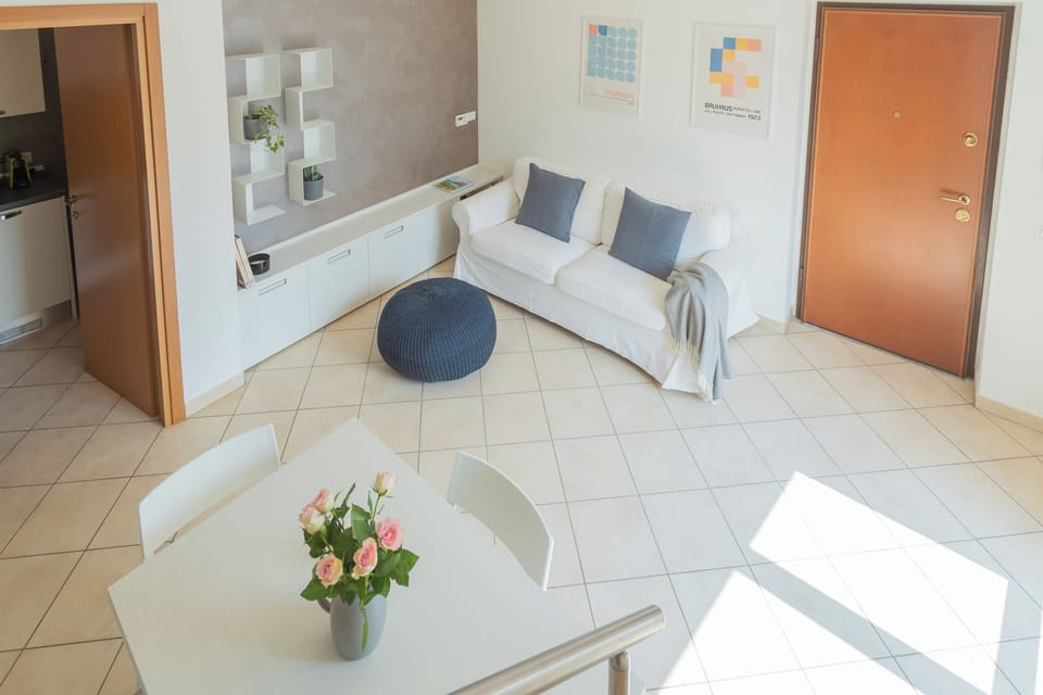 Apartment (1 Bedroom) | Living area | 32-inch Smart TV with cable channels