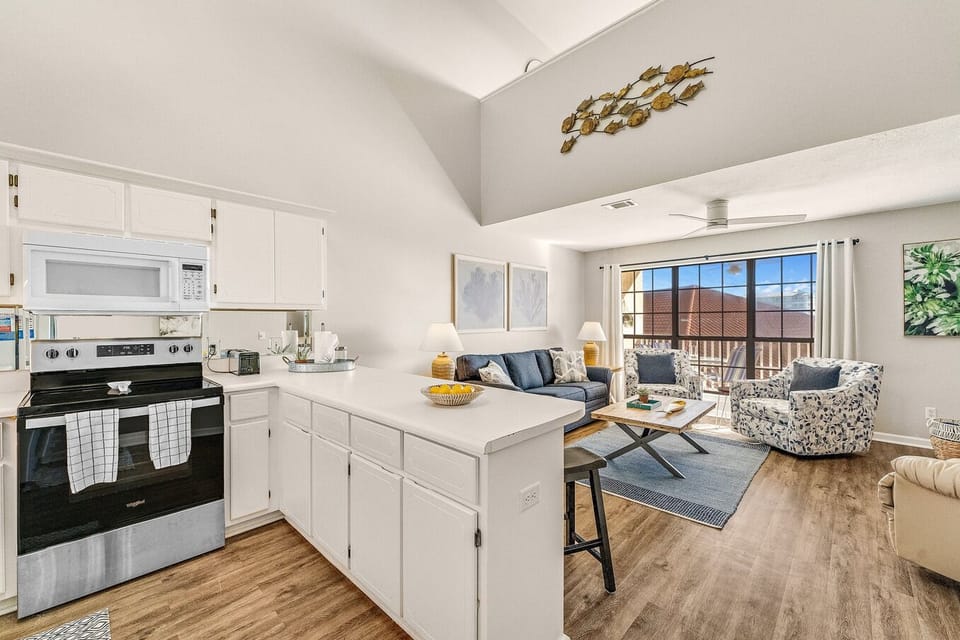 The openness of the kitchen and living room is perfect for gathering the family together while you cook!