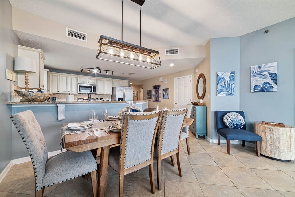 Gather, eat, and make memories. Our spacious dining area and adjacent breakfast bar provide plenty of room for guests to enjoy meals and conversations, creating the perfect setting for your vacation.