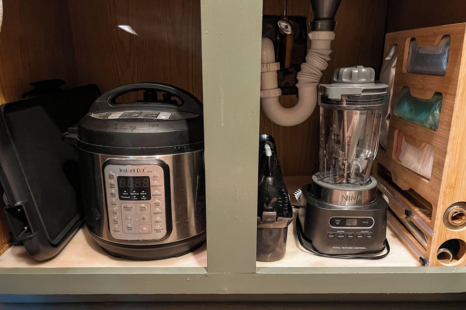 The kitchen is fully equipped, including a griddle, instant pot, blender, hand mixer and an assortment of food storage bags.