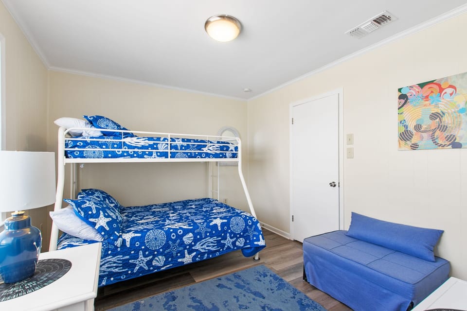Deluxe Condo, 2 Bedrooms, Non Smoking, Pool Access | Iron/ironing board, free rollaway beds, free WiFi, bed sheets