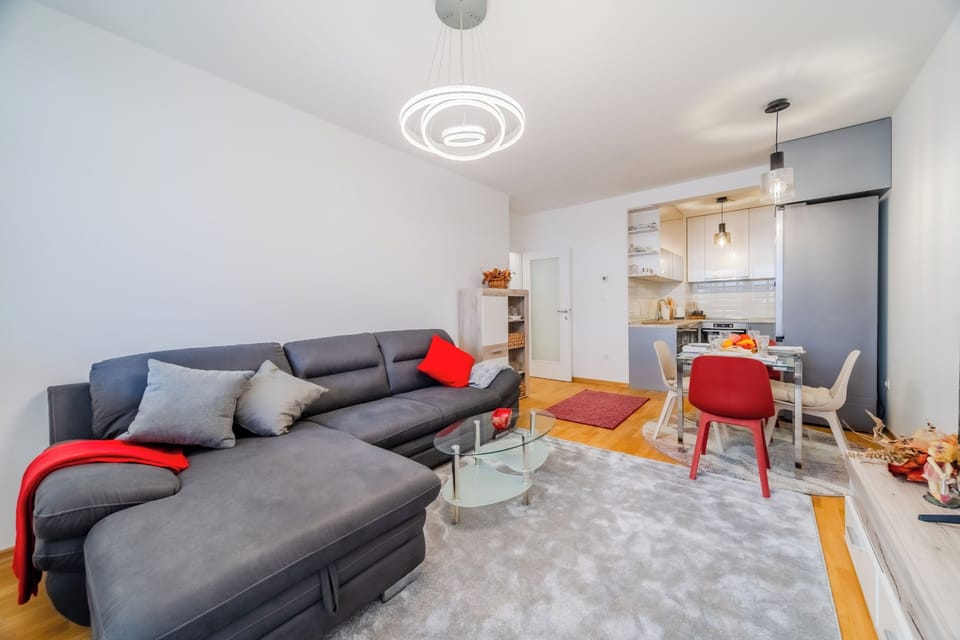 Family Apartment, 1 Bedroom, Microwave (Modern Oasis With Terrace) | Living area | Flat-screen TV