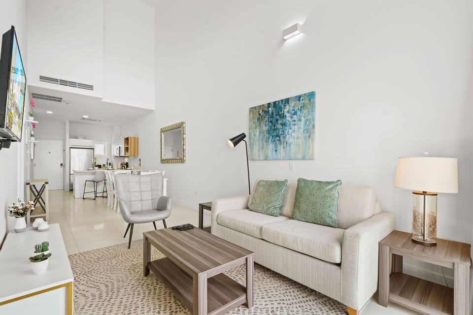 Stylidh living area with high ceilings