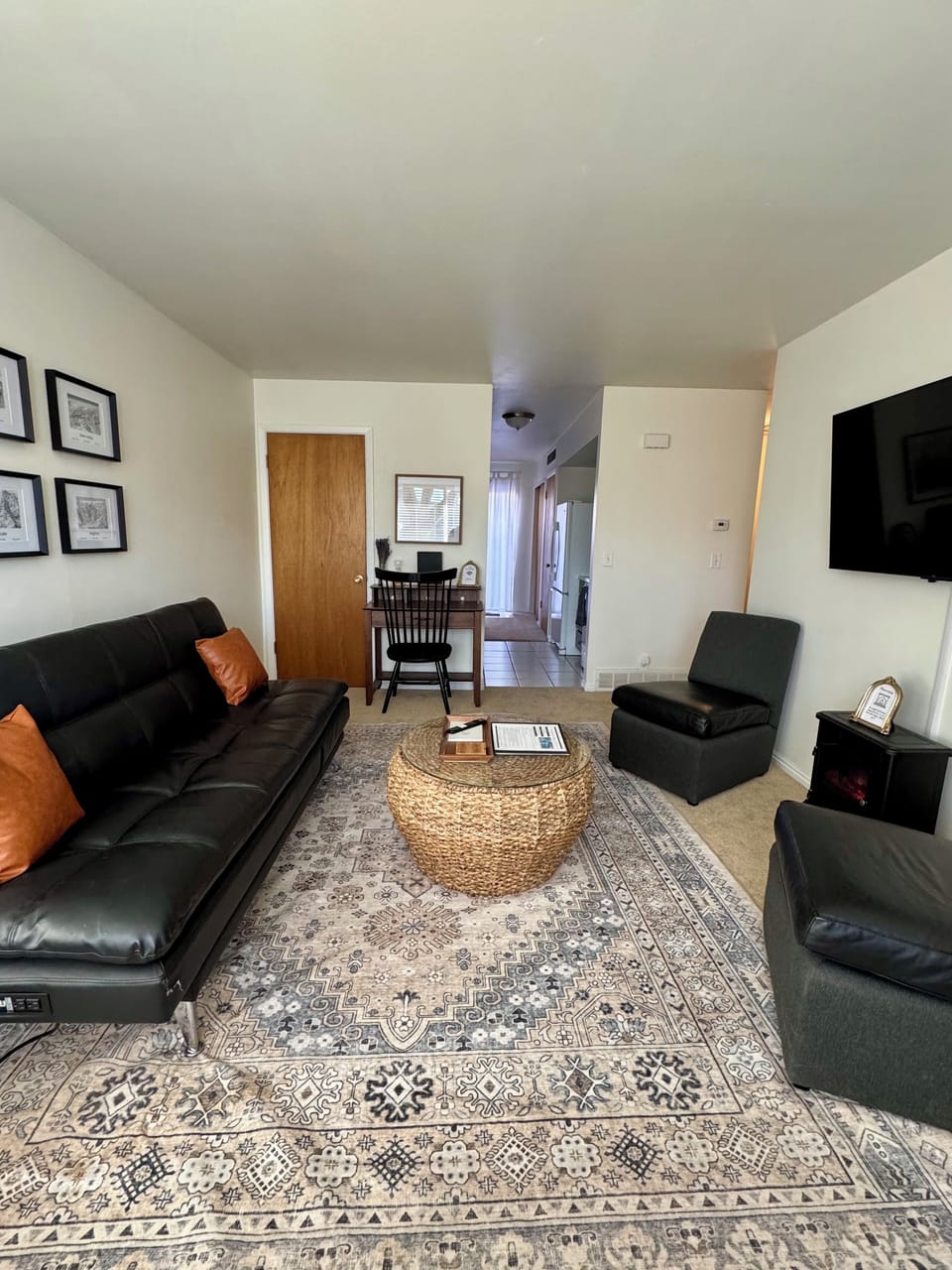 Living room with futon and extra seating. High speed internet and smart tv.