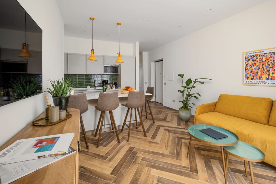 Luxury Apartment, Bay View | Living area | 50-inch flat-screen TV with satellite channels