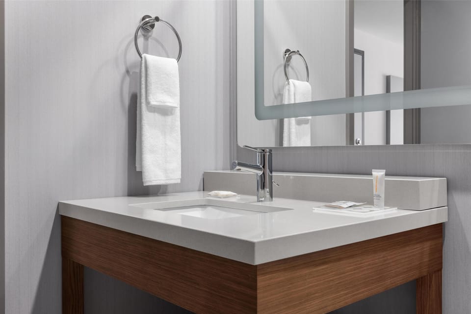 Eco-friendly toiletries, hair dryer, towels, soap