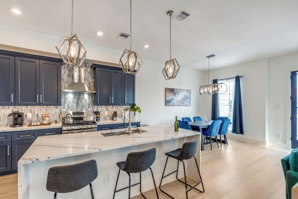 Open concept living room, dinning area, and kitchen is wow you and your guests.