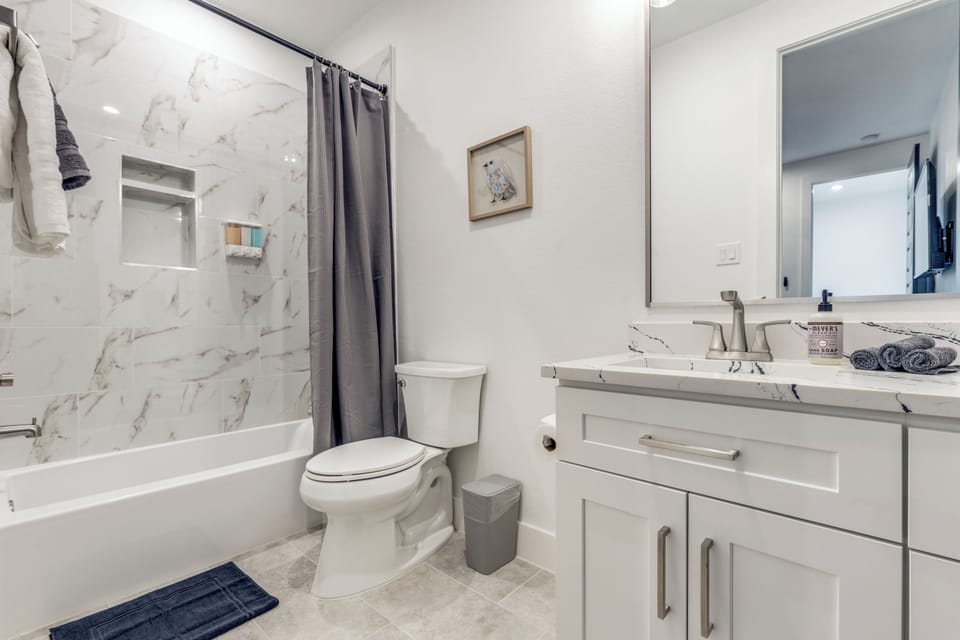 1st floor private bathroom with tub/shower.