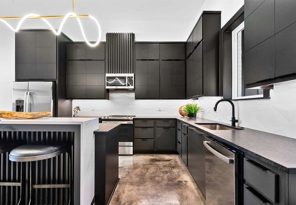 Compact but fully equipped, this kitchen is stocked with everything you need for a memorable cooking experience, from modern appliances to beautiful finishes.