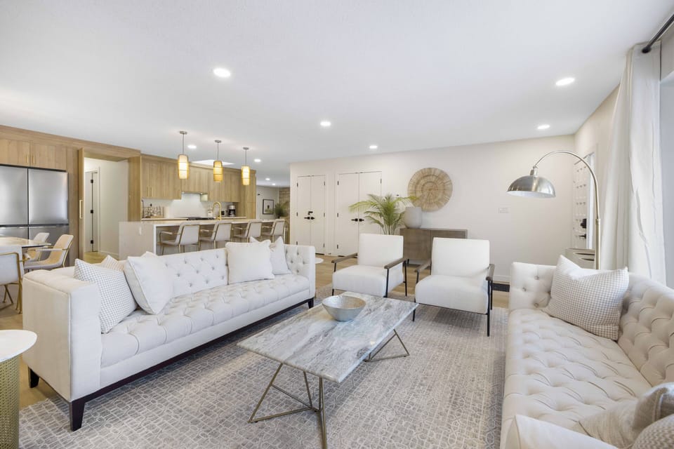 Kick back and unwind in the living room, where comfort and convenience meet.