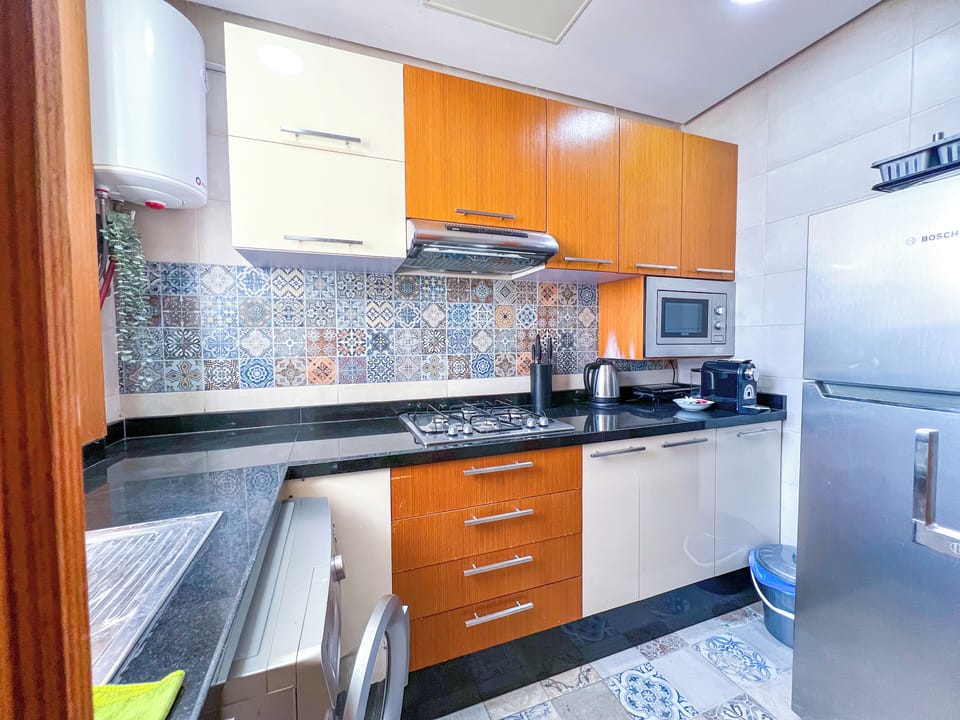 Luxury Apartment, City View | Private kitchen | Highchair