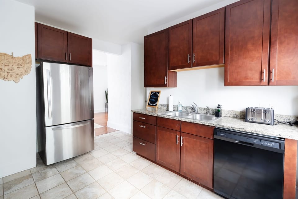 The granite countertops add the perfect touch of luxury to this already stunning kitchen.