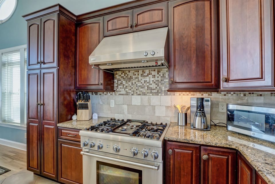 Well Stocked Kitchen with Stainless Appliances