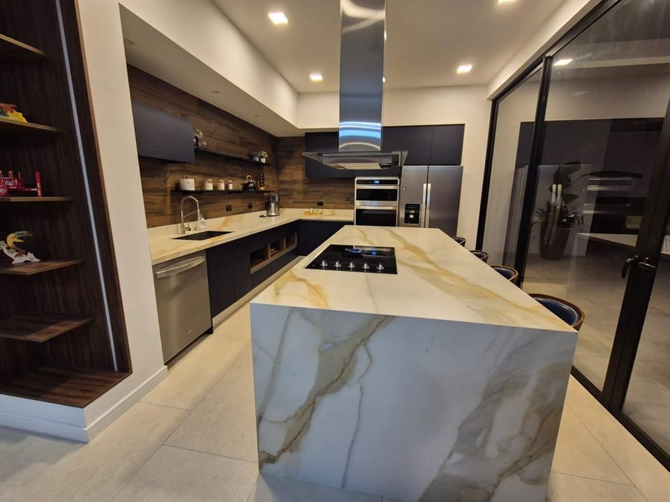 Our kitchen layout ensures easy navigation throughout the space. 