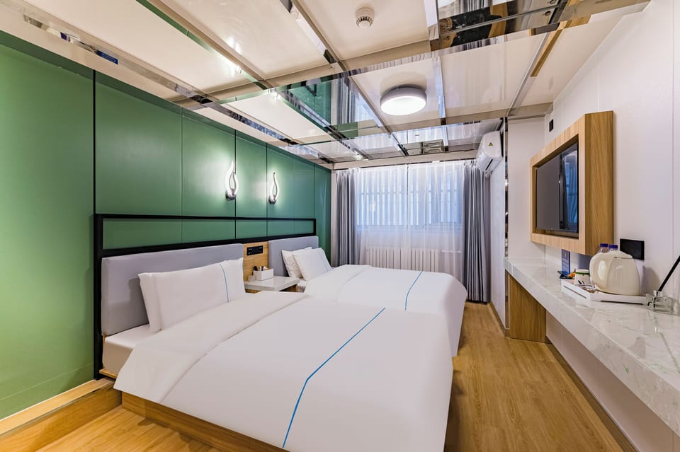 Premium bedding, blackout drapes, iron/ironing board, WiFi (free)