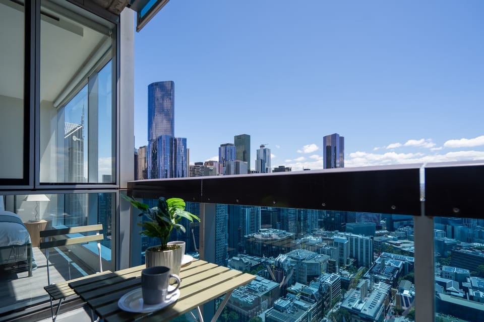 Balcony with outdoor furniture and stunning city view