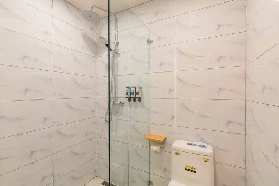 Shower, free toiletries, hair dryer, slippers