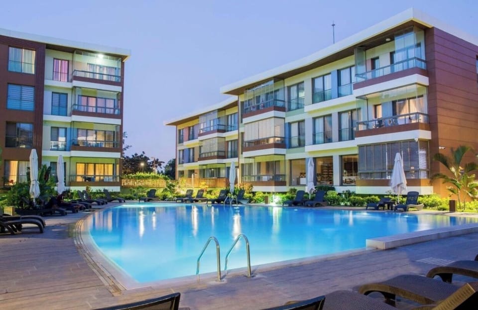 Outdoor pool, open 6:00 AM to 9:30 PM, pool umbrellas, sun loungers