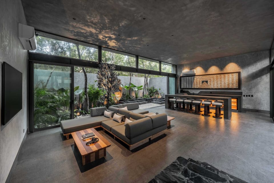 Two expansive living areas designed for gathering in serious style.