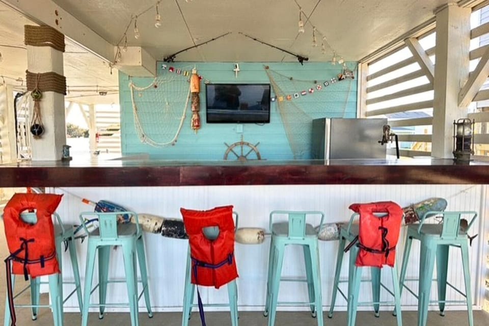 Outdoor Tiki Bar with TV and Refrigerator
