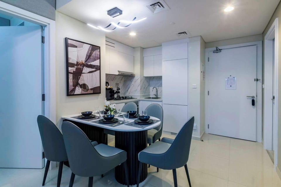 This inviting dining space in Business Bay, Dubai is perfect for enjoying meals. Surrounded by modern buildings and city energy, it offers a relaxed and lively atmosphere for dining.