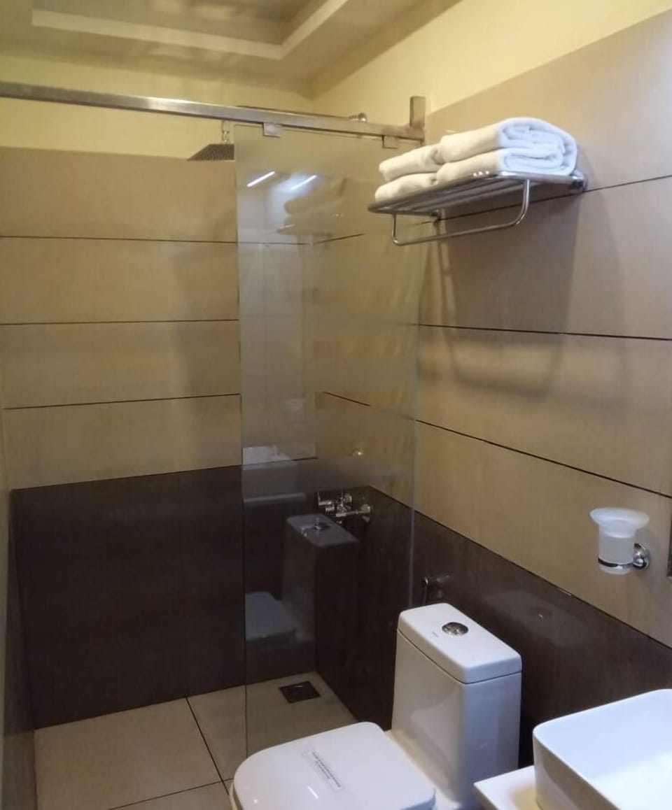 Shower, free toiletries, towels, soap