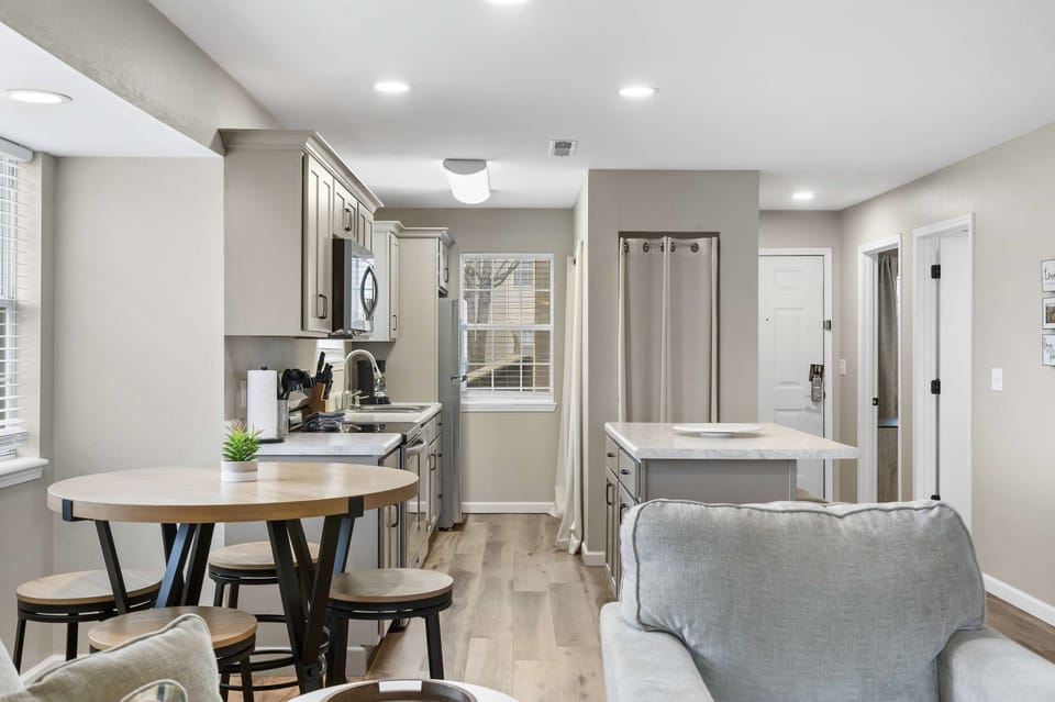 The bright, open kitchen offers ample space & every home comfort
