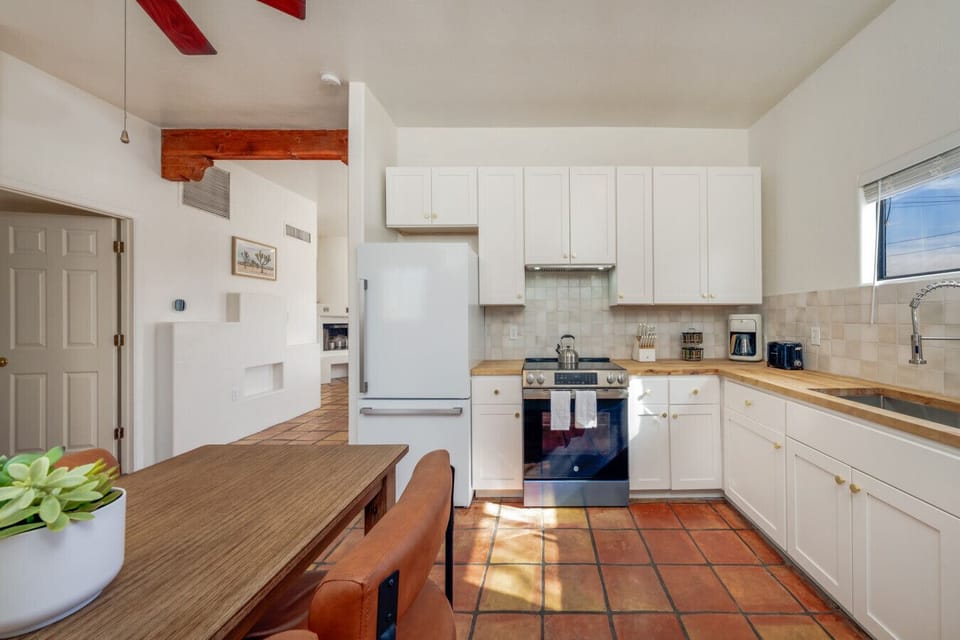 Updated kitchen with dining tUpdated, well-equipped kitchen with dining table that seats fourable that seats four