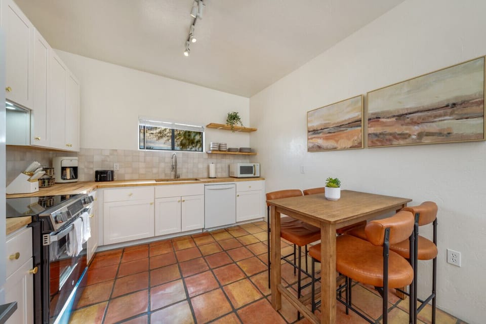 Updated, well-equipped kitchen with dining table that seats four