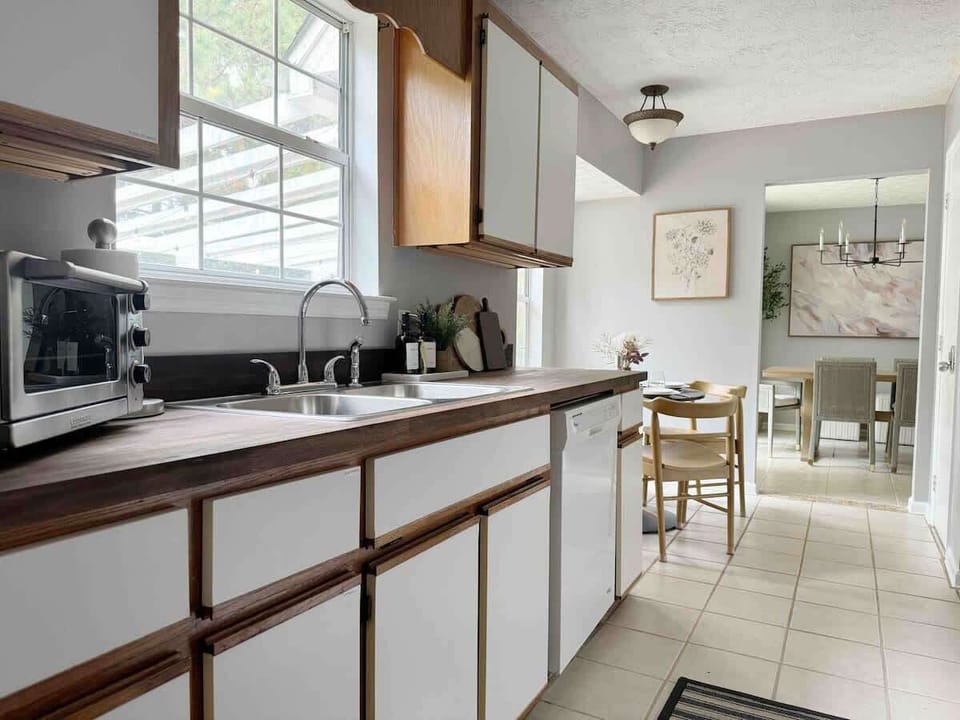 Charming and Lighthearted - This cozy, retro kitchen is filled with personality and all the essentials you need to create your next culinary masterpiece. 