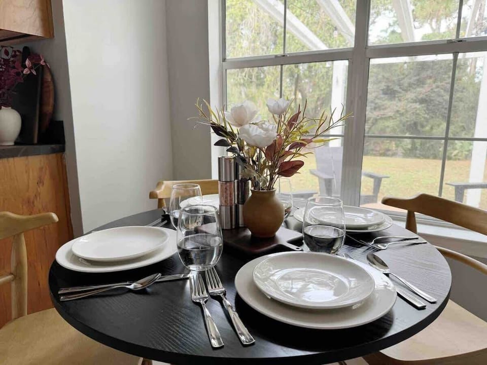 Detailed and Stylish - This bright little nook is fully set and ready for your next meal/. 
