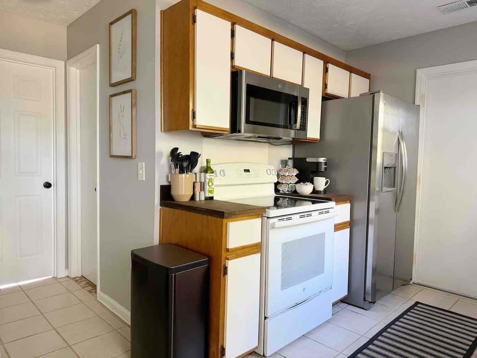This compact kitchen was designed for simplicity and functionality. All the basics are provided for your stay.