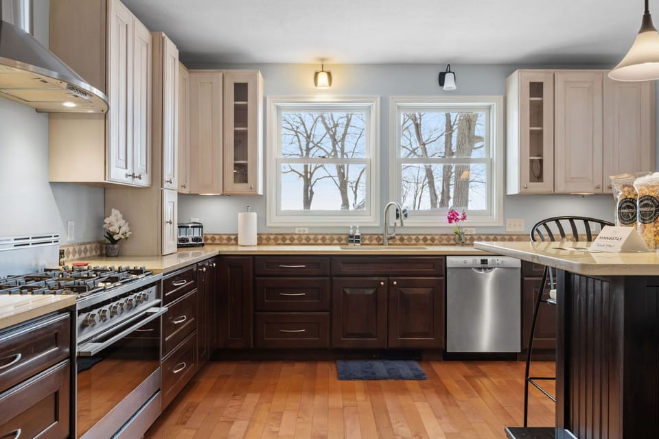 Cook your favorite meals in this fully equipped kitchen with modern appliances and plenty of counter space for prep.