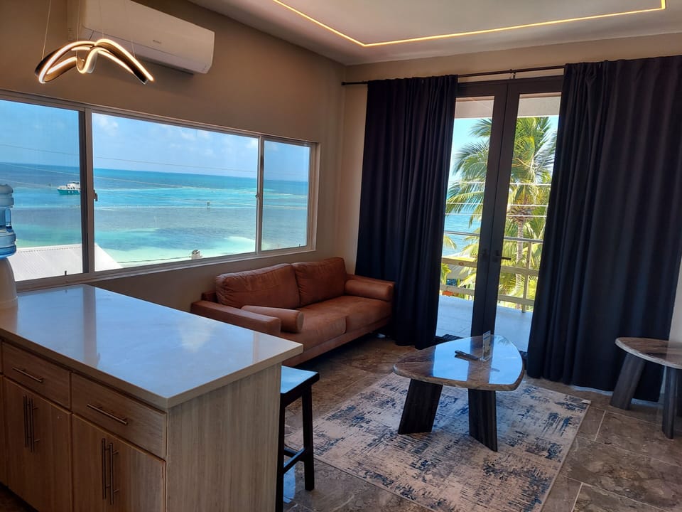 Luxury Condo, Balcony, Sea View | Living area | 42-inch Smart TV with digital channels, Netflix, streaming services