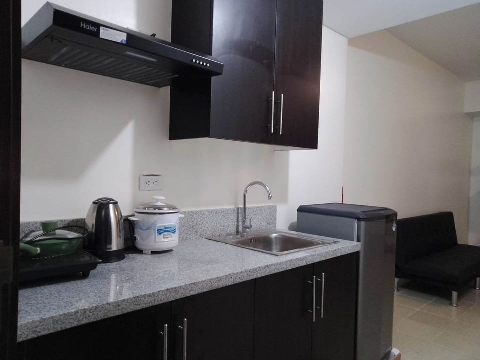 Family Condo, City View | Private kitchen | Stovetop, electric kettle, rice cooker, cookware/dishes/utensils