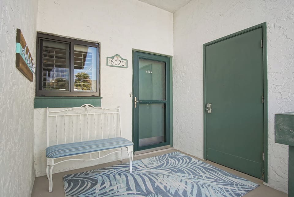 Front entrance with porch and storage closet